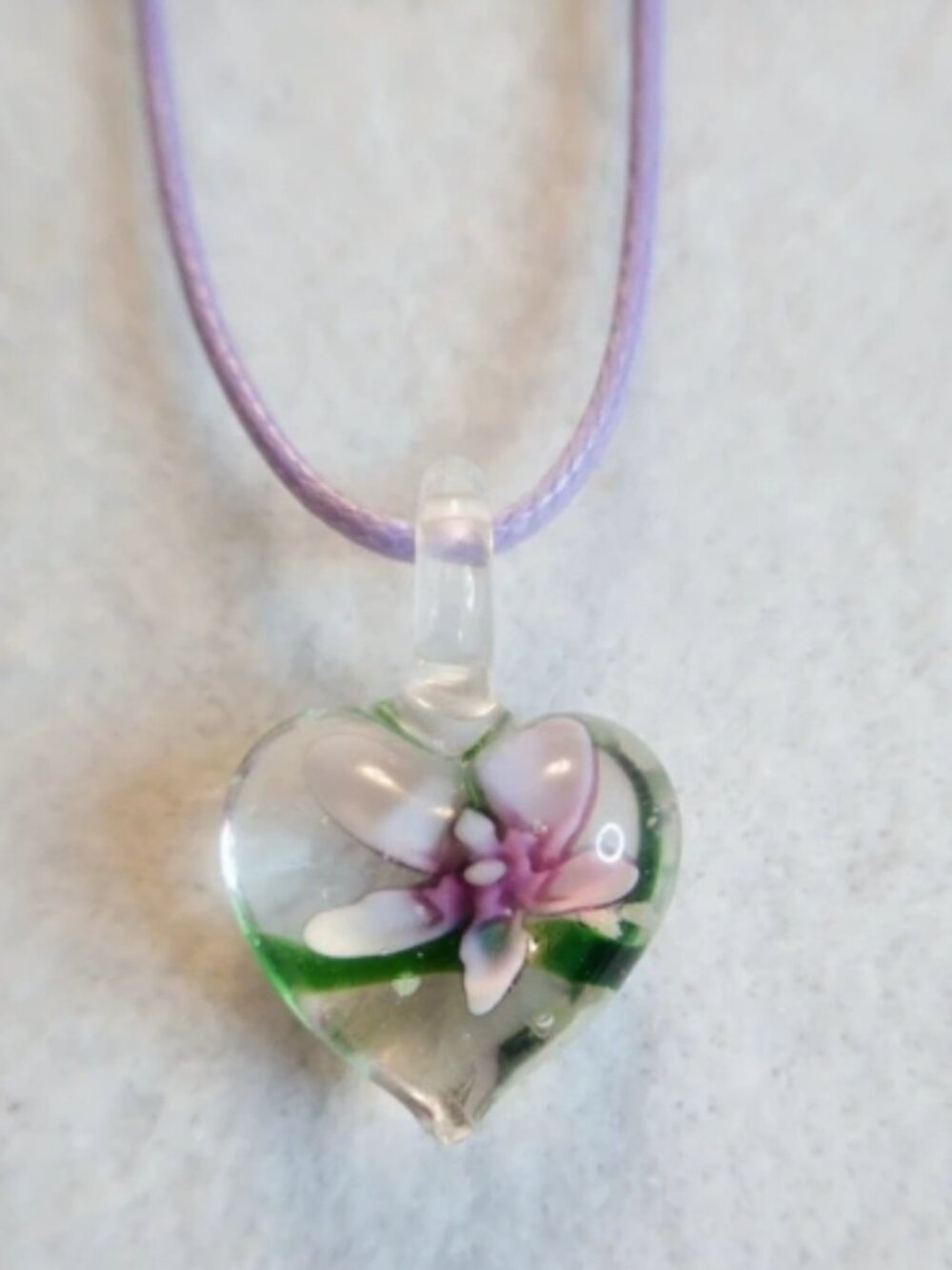 Lampwork glass heart pendant / Purple and white flower encased inside clear glas